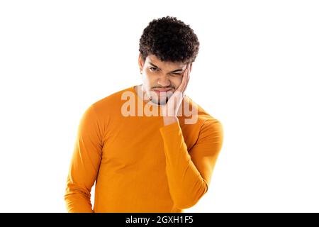 Cute african american man with afro hairstyle wearing a orange T-shirt isolated on a white background Stock Photo