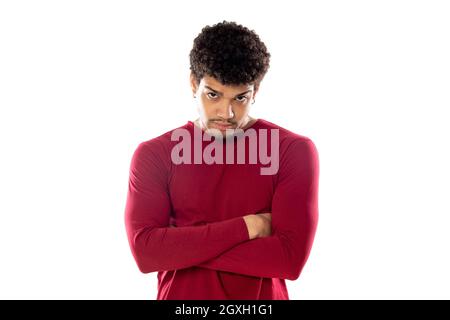 Cute african american man with afro hairstyle wearing a burgundy T-shirt isolated on a white background