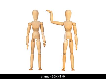 Many wooden mannequin doing differents gestures isolated on a white background Stock Photo