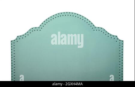 Pastel mint green soft velvet fabric shaped bed headboard isolated on white background, front view Stock Photo