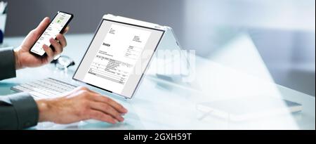 Accountant Checking Online Invoice On Tablet Screen Stock Photo