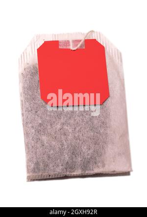 Teabag with red label. Top view. Isolated on a white. with clipping path Stock Photo