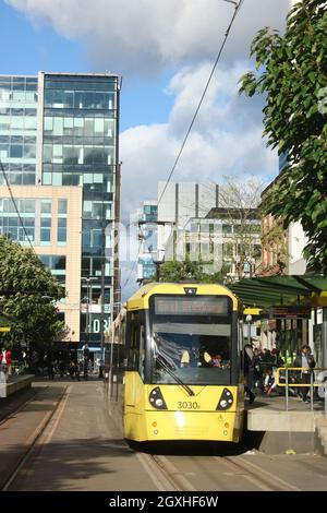 Manchester Metrolink Bombardier M5000 tram, number 3030, at the tram stop in St Peter's Square with a service to East Didsbury on 22nd September 2021. Stock Photo
