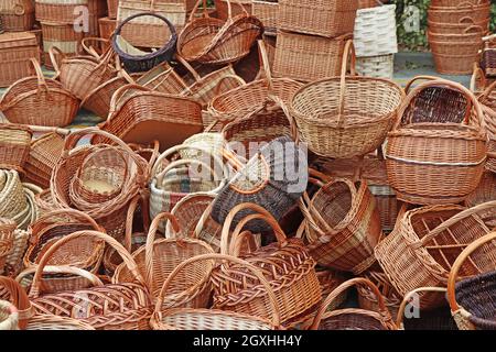 A bunch of various empty wicker wooden baskets Stock Photo