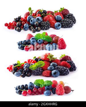 Set of fresh fruits and berries isolated a white background. Ripe blueberries, blackberries, currants, raspberries and strawberries. Berries and fruit Stock Photo