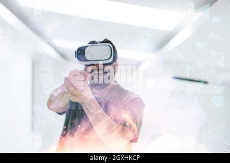 man trying virtual reality vr glasses at modern home with futuristic  neural network  dots graphic design Stock Photo