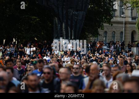 Ljubljana, Slovenia. 29th Sep, 2021. Protesters seen gathering at the Republic square during the demonstration.Thousands of people protested against the government, covid measures, wearing masks, vaccines and RVT green pass (Recovered-Vaccinated-Tested) condition in Ljubljana, Slovenia. (Credit Image: © Luka Dakskobler/SOPA Images via ZUMA Press Wire) Stock Photo