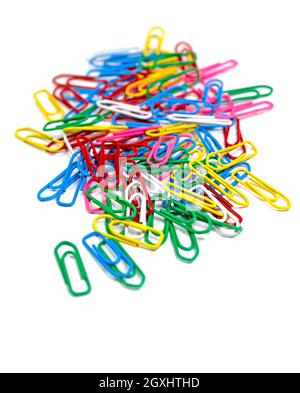 Lots of colorful paper clips against a white background Stock Photo