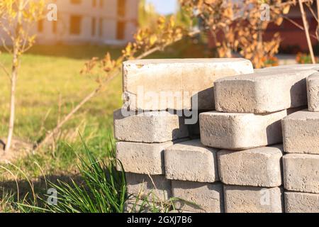 Paving slabs, construction site material close-up background Stock Photo