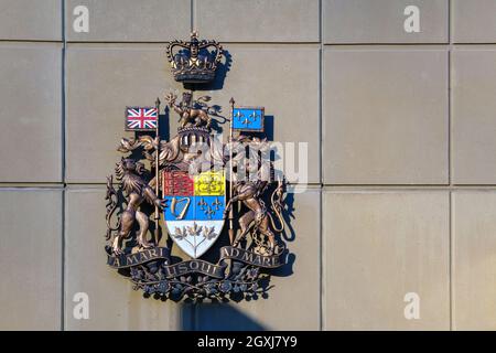 Calgary, Alberta, Canada - 1 October 2021: Arms of Canada on the wall of a building Stock Photo