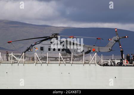 148826, a Sikorsky CH-148 Cyclone helicopter operated by the Royal Canadian Air Force, on board HMCS Fredericton (FFH-337), a Halifax-class (or City-class) frigate operated by the Royal Canadian Navy. The vessel is seen passing Greenock on the Firth of Clyde, as she heads out to participate in the military exercises Dynamic Mariner 2021 and Joint Warrior 21-2. Stock Photo