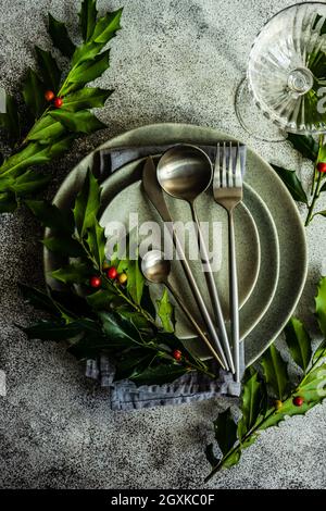 Festive table setting for Christmas dinner Stock Photo