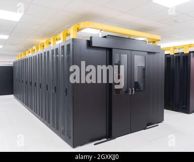 modern server room with black servers and hardwares in a internet data center Stock Photo