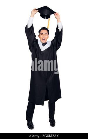 Full length of Excited young male graduation Stock Photo