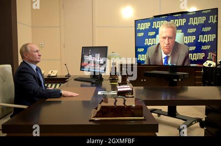 Novo-Ogaryovo, Russia. 05th Oct, 2021. Russian President Vladimir Putin holds a video meeting with Chairman of the Liberal Democratic Party of Russia Vladimir Zhirinovsky, from the Novo-Ogaryov state residence October 5, 2021 near Moscow, Russia. Credit: Alexei Druzhinin/Kremlin Pool/Alamy Live News Stock Photo