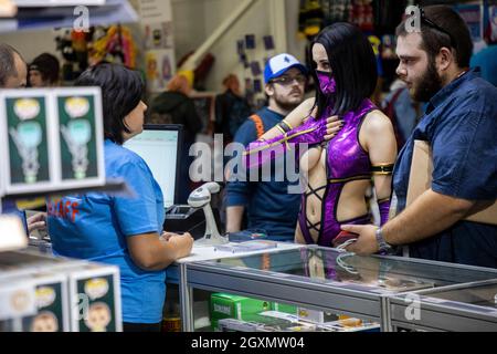 Moscow, Russia. 3rd October, 2019 Customers choose a product on a counter of the Comic Con Russia 2019 and  the 2019 Igromir computer and video games exhibitions at the Crocus Expo International Exhibition Center in Moscow region, Russia Stock Photo