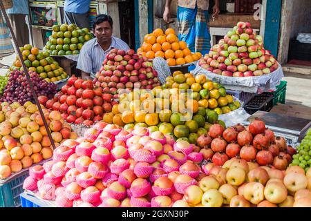 BOGRA, BANGLADESH - NOVEMBER 7, 2016: Fruit seller in Bogra Bangladesh Stock Photo