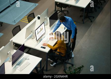 Managers works on computers, workplace in office Stock Photo