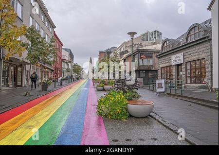 Reykjavik, Iceland – September 22, 2021:  Downtown street with a rainbow flag painted on the pavement Stock Photo