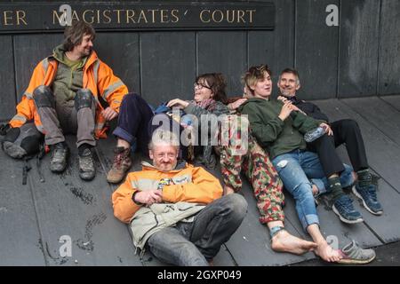 London, UK. 5th Oct, 2021. The six eco-activists who spent a month inside Euston Square Gardens STOP HS2 Camp tunnel were summoned to court. Swampy (Daniel Hooper, 48), Dr Larch Maxey, 49, Digger Down (Scott Breen, 47), Nemo (Juliett Stevenson-Clarke, 22), Blue (Isla, 18) and Lazer (Lachlan, 20) Sandford, went on trial for alleged offences linked to the tree protection camp and tunnels set at Euston Square Gardens, between August 28th 2020 and February 2021. (Credit Image: © Sabrina Merolla/ZUMA Press Wire)