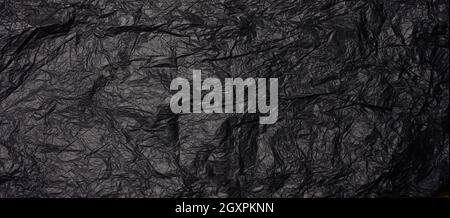 crumpled black paper, abstract texture background, banner Stock Photo
