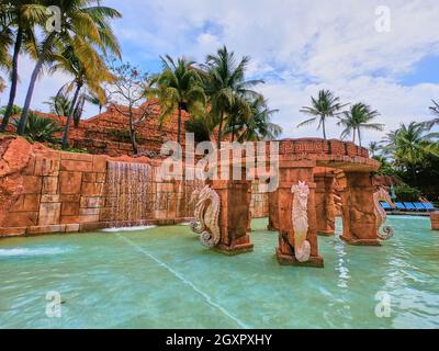 Small wading pool in resort with tropical architecture Stock Photo