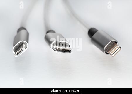 Three types of peripheral  cables connectors for charging or data. Concept EU rules to change universal charge plug to USB C Stock Photo