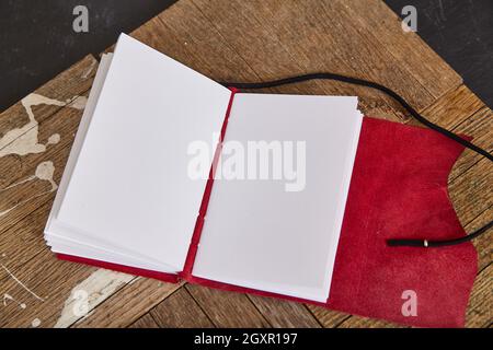 Pages blank of open journal sketchbook with red leather Stock Photo