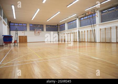 elementary school gym indoor with volleyball net Stock Photo