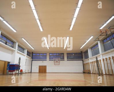 elementary school gym indoor with volleyball net Stock Photo