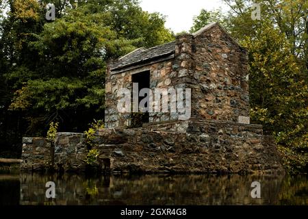 Tranquil speedwell lake park historic Ironworks building in Morristown, NJ Stock Photo