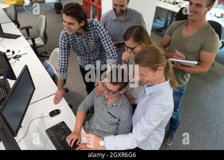 startup business people group working as team to find  solution Stock Photo