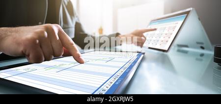 Convertible Laptop Gantt Chart Software And Digital Agenda Stock Photo
