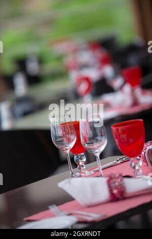 table setting at modern tropical restaurant Stock Photo