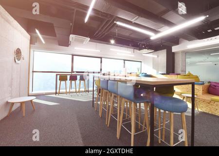interior of relaxation area in Modern sunny bright Open Plan Office Stock Photo