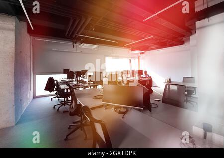 software developers working everyday job writing programming code at modern sunny bright open plan office Stock Photo