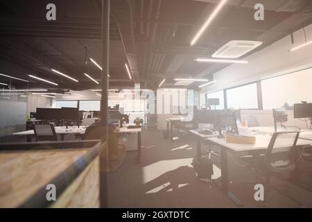 software developers working everyday job writing programming code at modern sunny bright open plan office Stock Photo