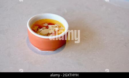 High Class Restaurant Sugar Fix Confection Deserts Vanilla Custard with Almonds Stock Photo