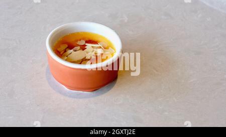 High Class Restaurant Sugar Fix Confection Deserts Vanilla Custard with Almonds Stock Photo