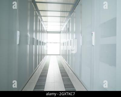 modern server room with white servers and hardwares in a internet data center Stock Photo