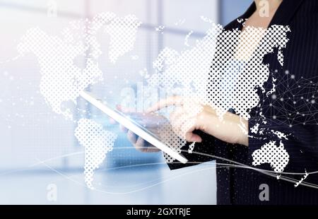Global technologies concept. Hand touch white tablet with digital hologram world, earth, map, globe sign on light blurred background Stock Photo