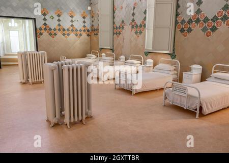 Barcelona, Spain - September 19, 2021: Ancient hospital patients room in Sant Pau hospital in Barcelona with beds Stock Photo