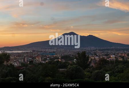 Mt. Vesuvius at sunset, seen from Castellammare di Stabia on the Sorrento coast, Golfo di Napoli, Italy. Stock Photo