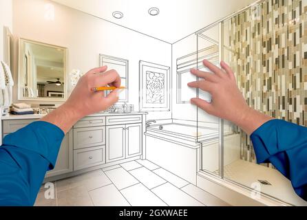 Male Hands Sketching Beautiful Custom Bathroom Gradating to Finished Construction. Stock Photo