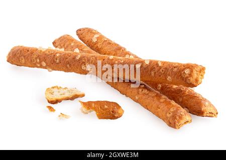 Three salted pretzel sticks with crumbs isolated on white. Stock Photo