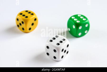 Three colorful dices isolated on white background. Top view Stock Photo