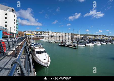 Apartments and moored yachts at Brighton Marina, Brighton, East Sussex, England, Uk Stock Photo