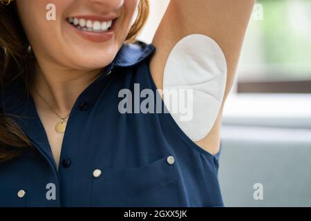 Underarm Sweat Patch Or Pad To Prevent Odor And Sweat Marks Stock Photo