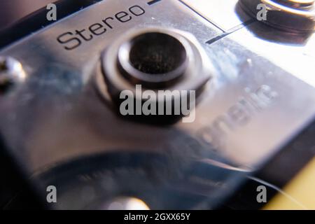 Silver stereo output jacks of classic electric guitar Stock Photo