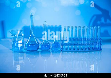 Laboratory equipment, glass filled background Stock Photo